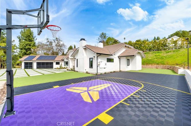 Private backyard sport court on the expansive Gloucester Lane lot in Thousand Oaks